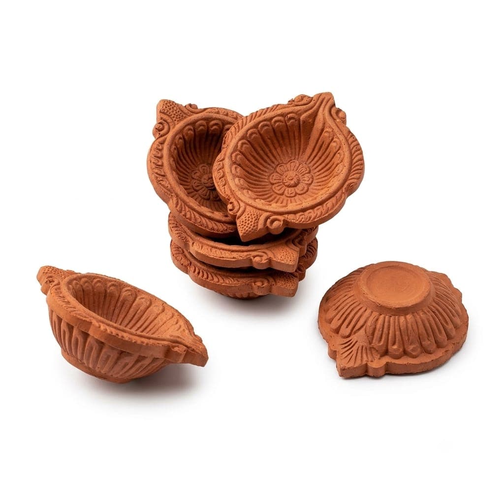 Terracotta diyas in a natural clay finish