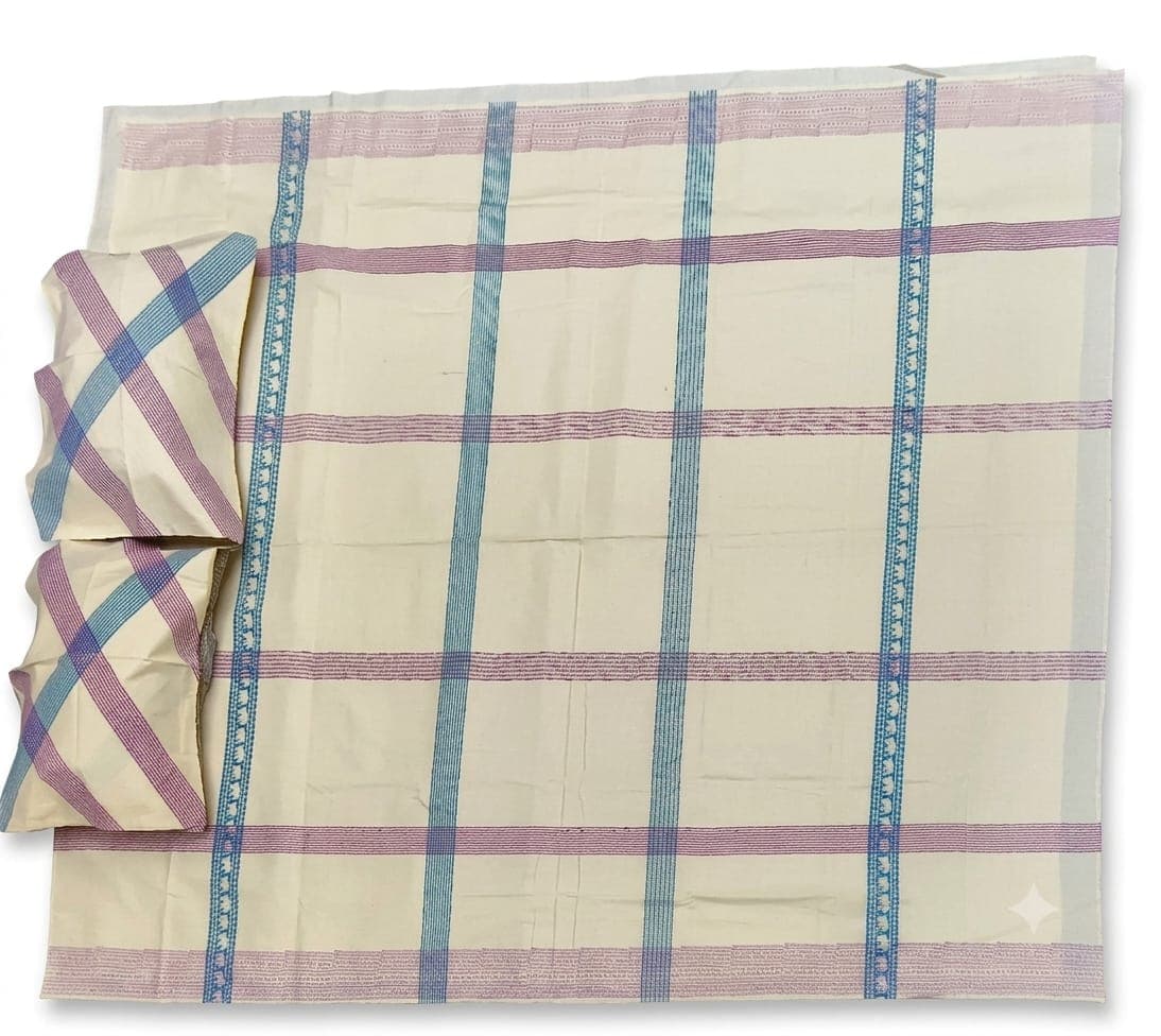 Checked bedspread with folded corner and block-printed border