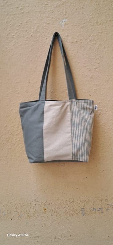 Small colour-block tote in grey and cream canvas with a fine stripe panel